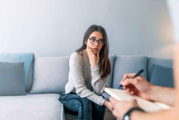 woman talking to a therapist