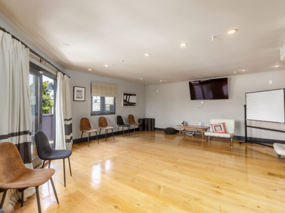 wide angle group therapy room addiction treatment in Los Angeles California. Tulua health